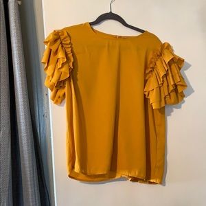 flowy top ruffled sleeves